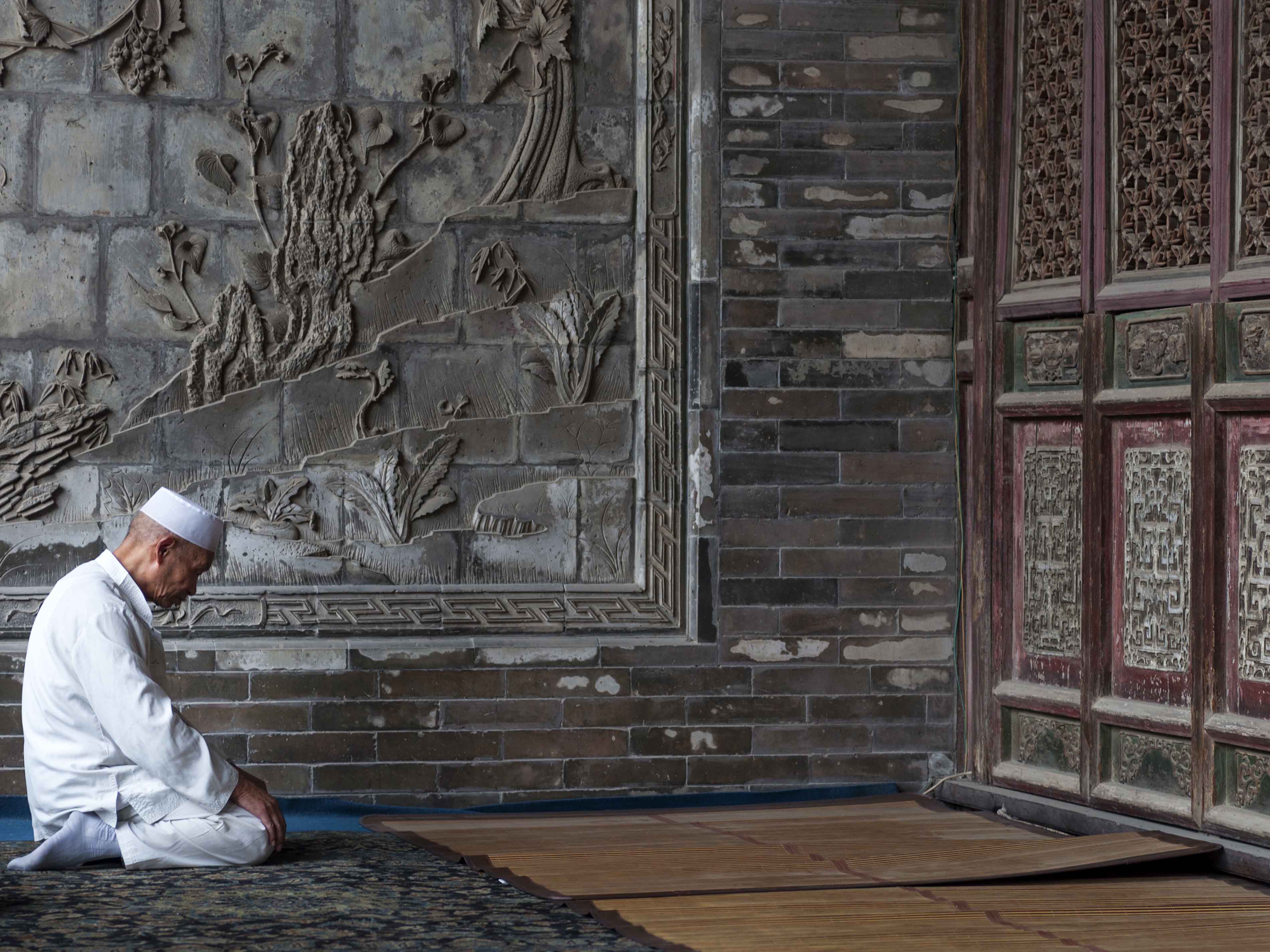 A Muslim is Praying in the Mosque